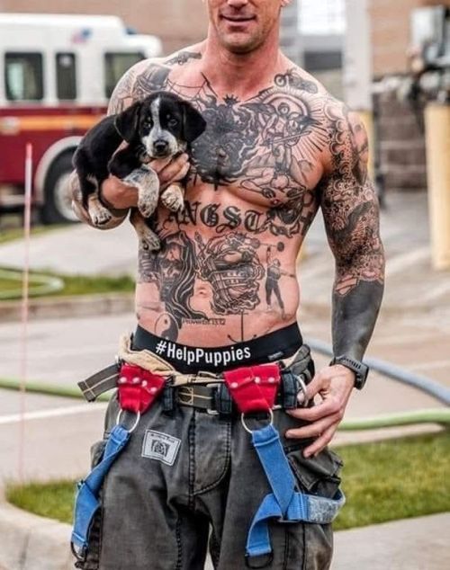 Fireman and firehouse dog